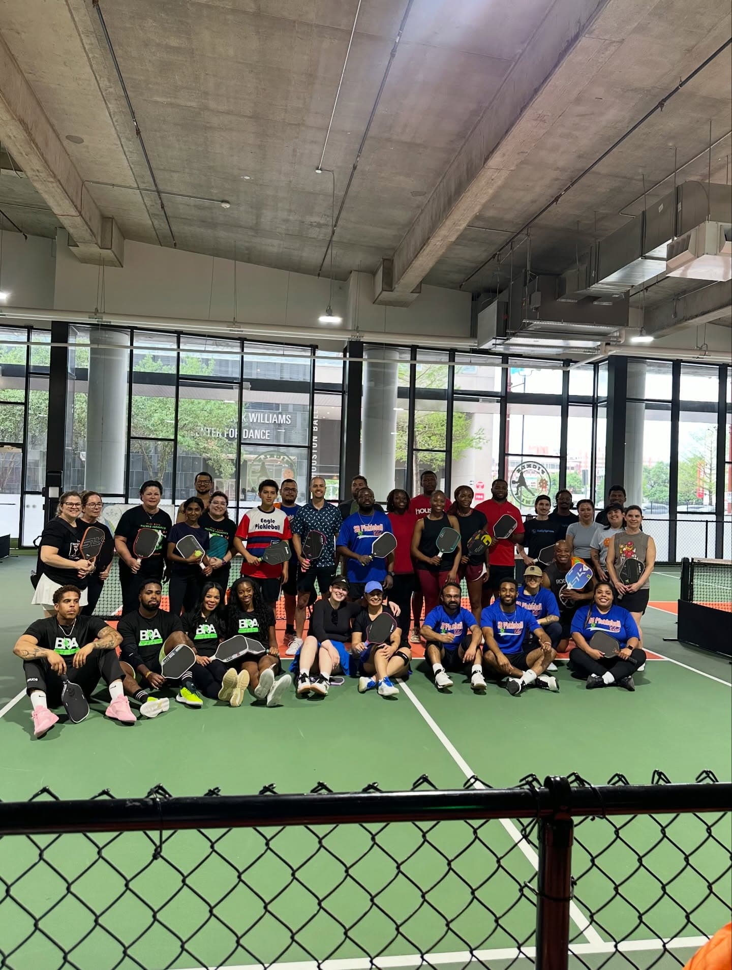 Players rallying on a climate-controlled court